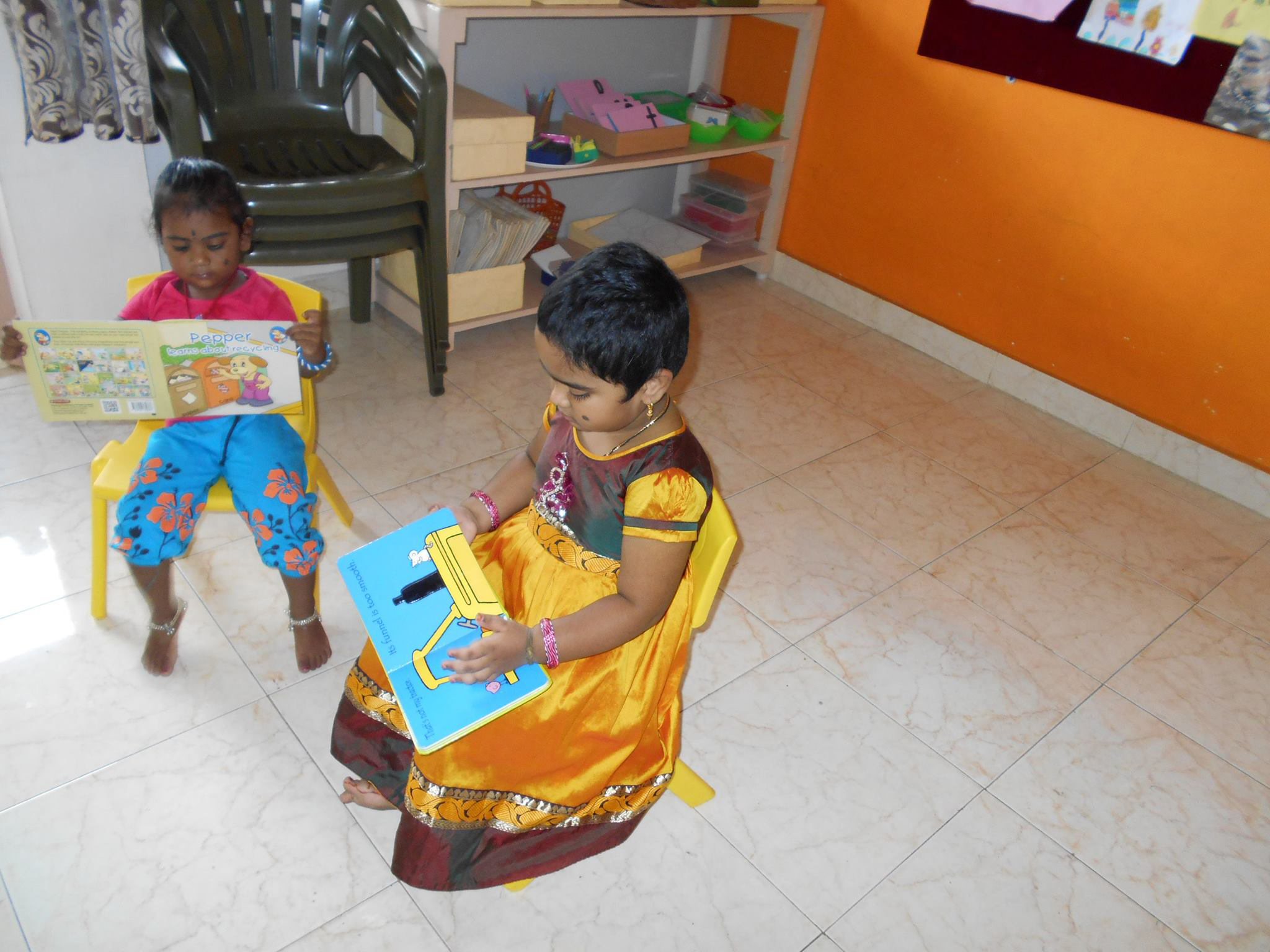 A B Cube Day Care children reading books 